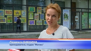«Про лето» в окнах НХМ